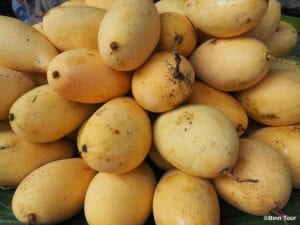 Thai mangoes piled up on each other